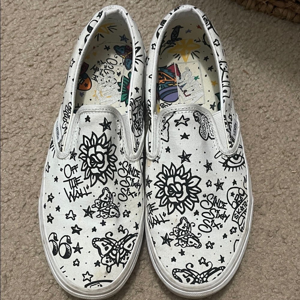 Vans Womens White Slip-On Sneakers with Black Graphic Doodles